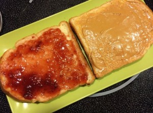Peanut Butter and Strawberry Jam on Butter Top Bread